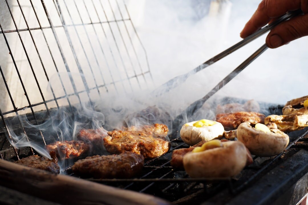grill with meat on barbecue